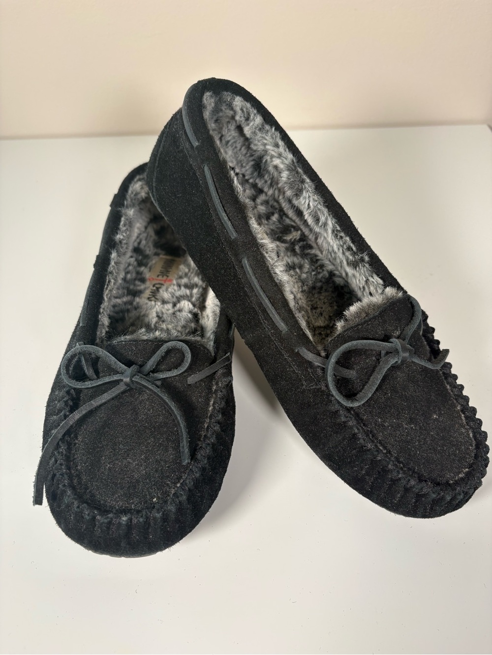 Minnetonka Black Suede Moccasins with Gray Faux Fur Lining